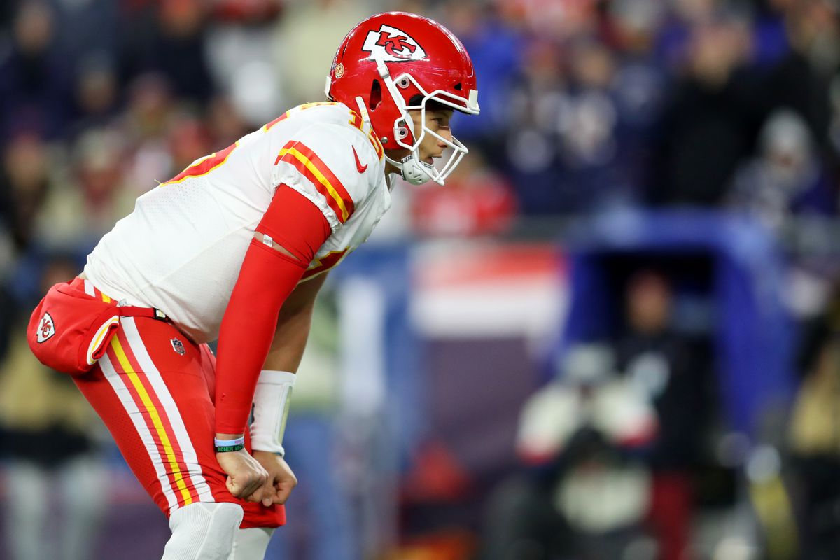 Patrick Mahomes of the Kansas City Chiefs looks on during the game against the New England Patriots at Gillette Stadium on December 08, 2019 in Foxborough, Massachusetts.