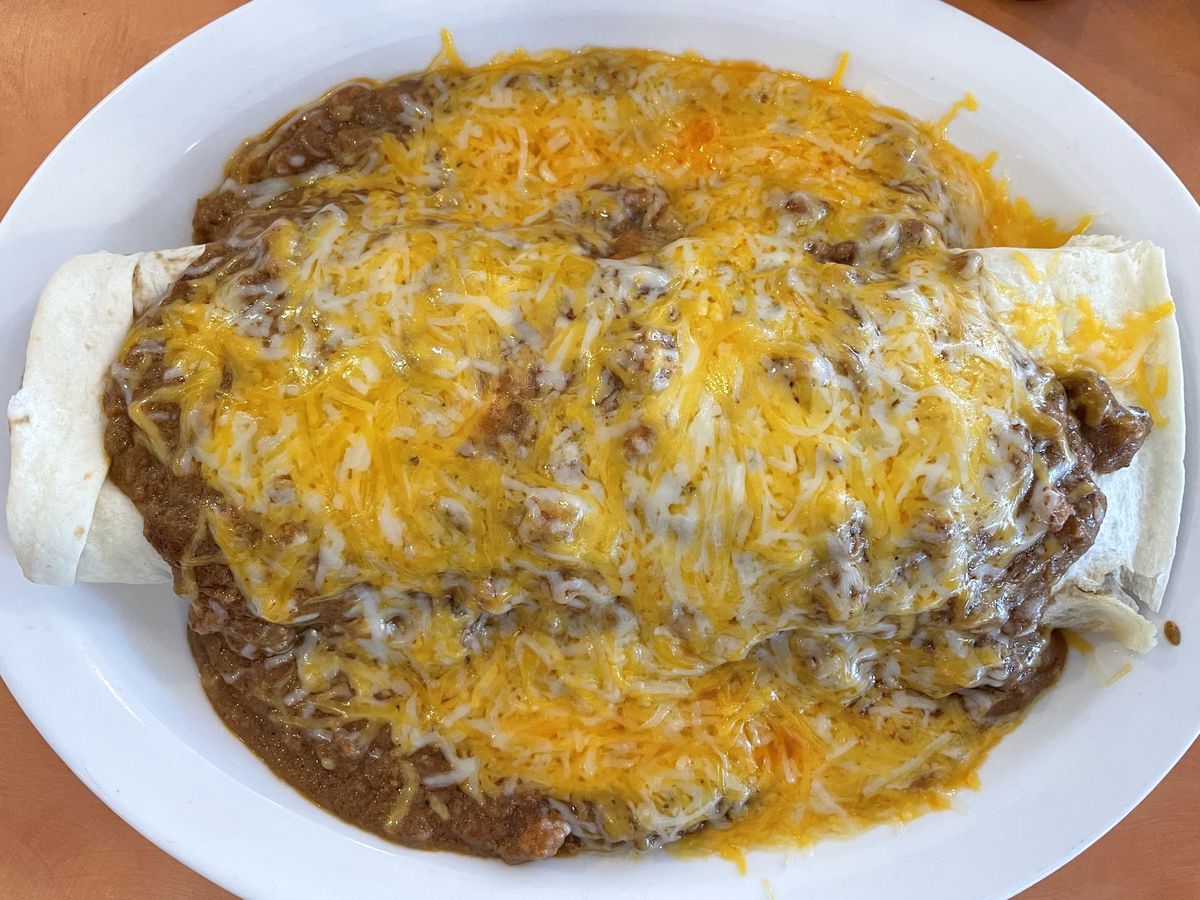 Burrito smothered with bean chili and cheese