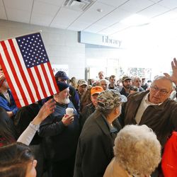 An overflow crowd waits to get in to cast their votes at a Republican caucus Saturday, March 5, 2016, in Chelsea, Maine. 