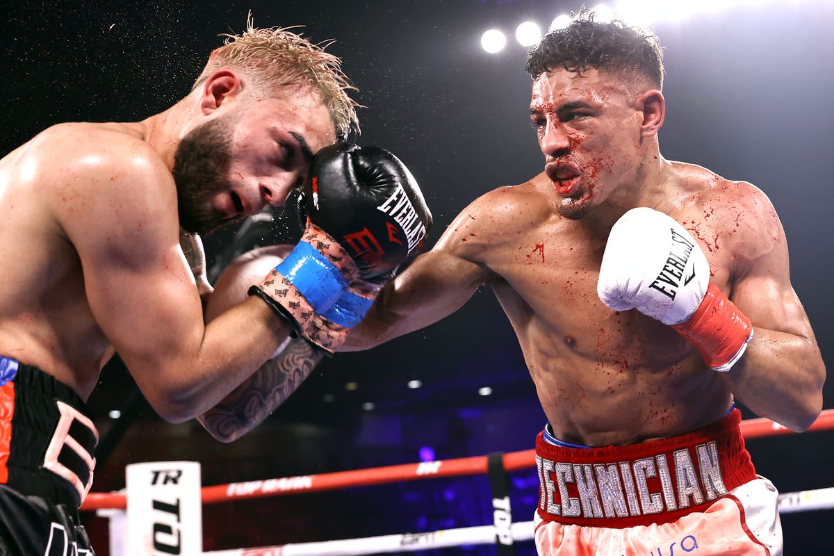 Joseph Adorno and Jamaine Ortiz exchange punches during their fight at the Silver Spurs Arena on April 24, 2021 in Kissimmee, Florida.