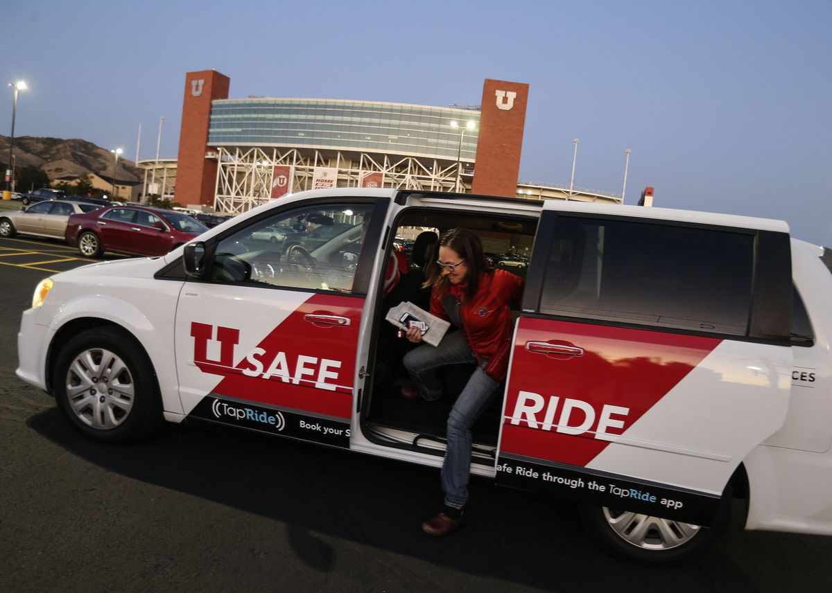 University of Utah Hospital employee Jami Huntington exits a SafeRide vehicle at the TRAX station located at Rice Eccles Stadium in Salt Lake City on Wednesday, Oct. 2, 2019. SafeRide provides a safe and reliable mode of transportation on campus to ensure safety during night hours. The university says the service is available to anybody in the university community, but they stress it is especially meant to serve students on campus at night who need a safe ride to a parking lot, student housing or to another building on campus. The idea was brought forth by students on the University’s Safety Task Force assembled by U. President Ruth Watkins after student-athlete Lauren McCluskey was murdered on campus in October.