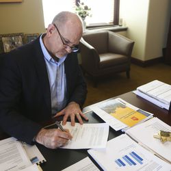 State Treasurer David Damschen works in his office at the Capitol in Salt Lake City on Friday, Jan. 25, 2019. Damschen is tasked to find ways for medical marijuana businesses and state agencies to get or maintain banking services.