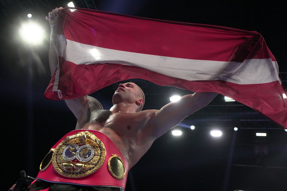 Mairis Briedis of Latvia celebrates after winning the cruiserweight IBF World Champion title boxing match against Artur Mann of Germany at the Arena Riga, in Riga, Latvia, Oct. 16, 2021.