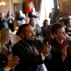 Students and professors applaud as Salt Lake Community College President Deneece G. Huftalin outlines an institutional initiative aimed at fundamentally changing higher education opportunities for residents in the Salt Lake Valley during an event at the Capitol in Salt Lake City on Thursday, March 3, 2016.  SLCC Promise will help eligible, full-time students pay for their education by covering the cost of tuition and fees when federal grants fall short.