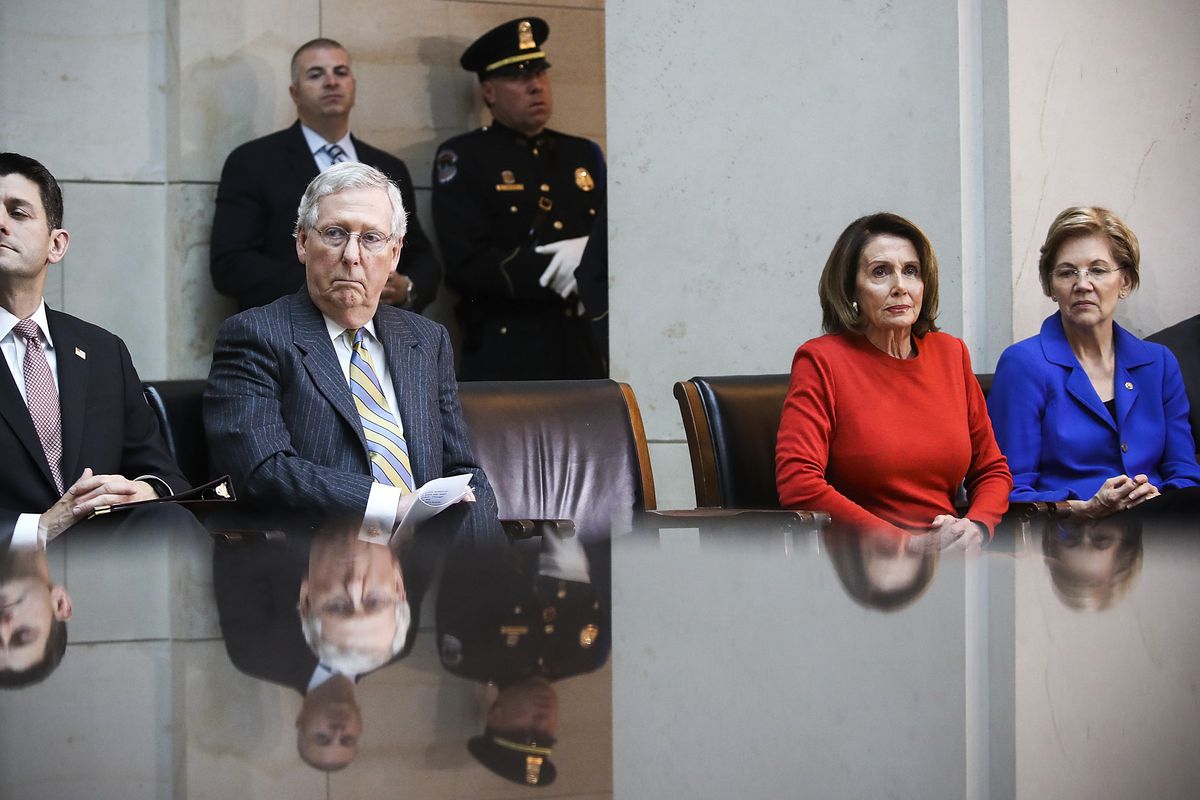 (L-R) House Speaker Paul Ryan (R-WI), Senate Majority Leader Mitch McConnell (R-KY), House Minority Leader Nancy Pelosi (D-CA), Sen. Elizabeth Warren (D-MA), participate in a ceremony to honor American prisoners of war and the nearly 83,000 servicemen and