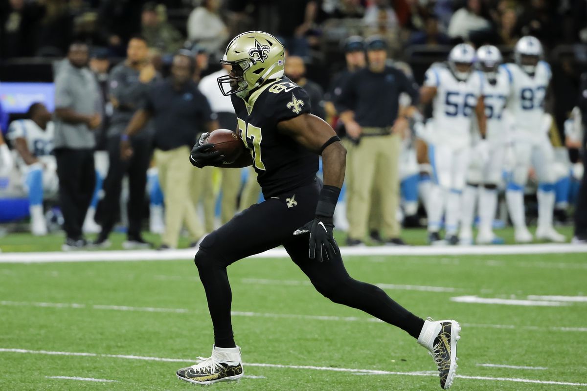 New Orleans Saints tight end Jared Cook runs after a catch against the Carolina Panthers during the first half at the Mercedes-Benz Superdome.