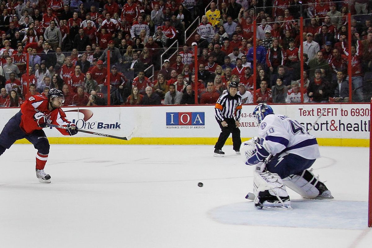 WASHINGTON, DC - "Uh...guys? Guys?!?".  Dustin Tokarski gets a taste of playing behind NHL defense, 2011-12 Tampa Bay Lightning style. (Photo by Rob Carr/Getty Images)