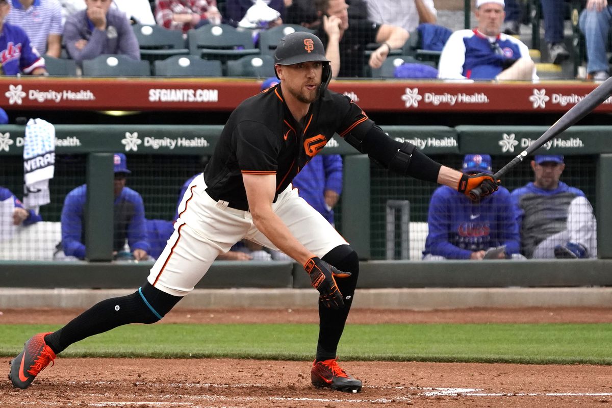 San Francisco Giants right fielder Hunter Pence hits against the Chicago Cubs during a spring training game at Scottsdale Stadium.