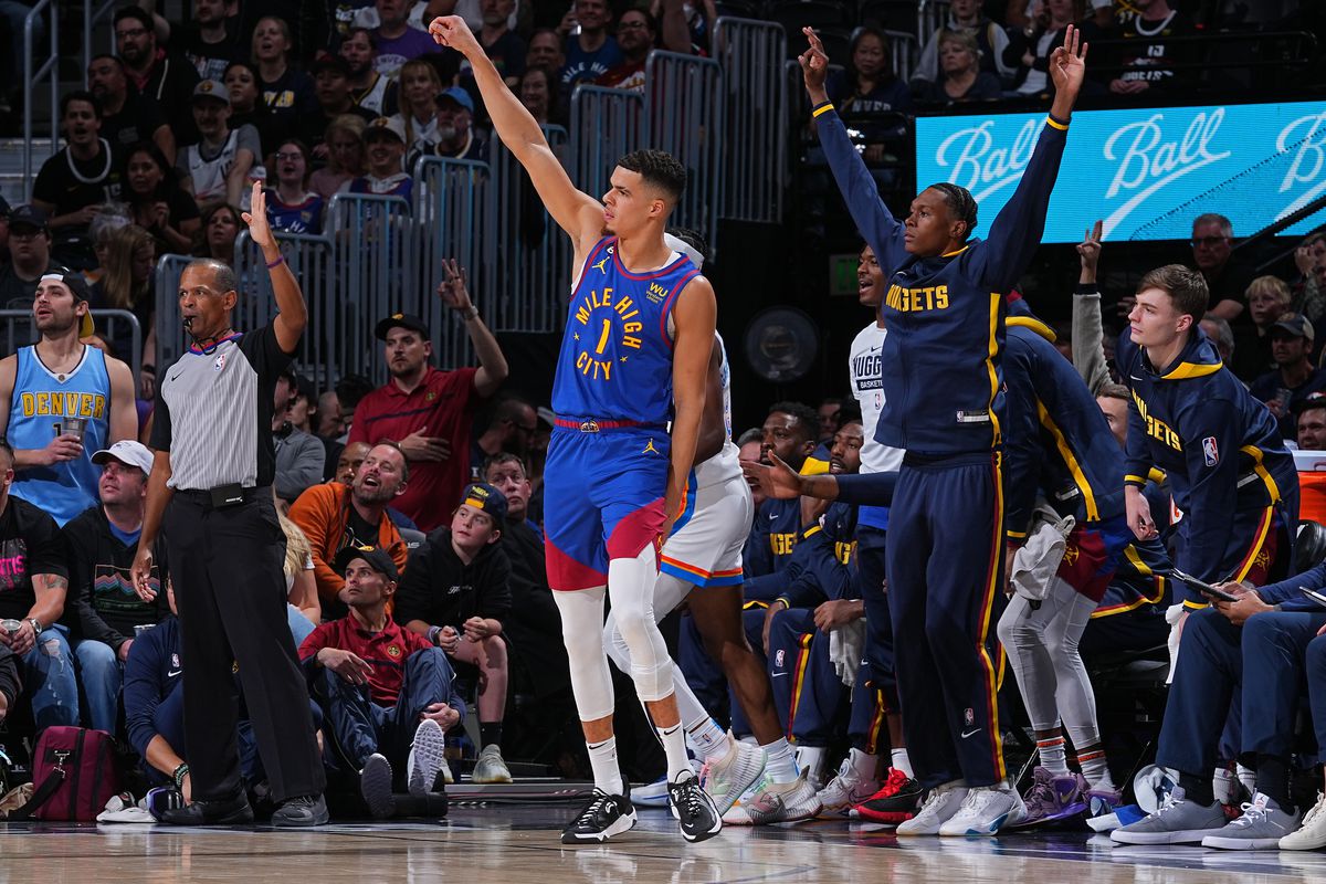 Michael Porter Jr. of the Denver Nuggets celebrates a three point basket against the Oklahoma City Thunder on October 22, 2022 at the Ball Arena in Denver, Colorado.&nbsp;