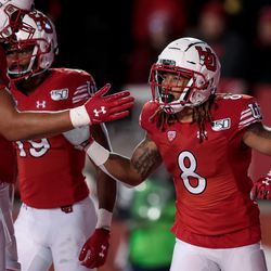 Utah Utes wide receiver Derrick Vickers (8) celebrates after scoring on a 7-yard run, putting the Utes up 31-13 over the Washington State Cougars after the PAT, at Rice-Eccles Stadium in Salt Lake City on Saturday, Sept. 28, 2019.