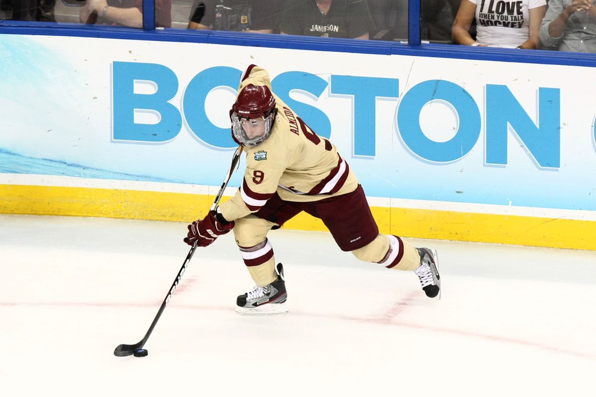 Apr 7, 2012; Tampa, FL, USA; Boston College Eagles forward Barry Almeida (9) against the Ferris State Bulldogs during the first period of the finals of the 2012 Frozen Four at Tampa Bay Times Forum. Mandatory Credit: Douglas Jones-US PRESSWIRE