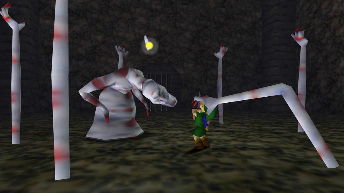 Dead Hand grabs young Link in the Bottom of the Well dungeon in Ocarina of Time