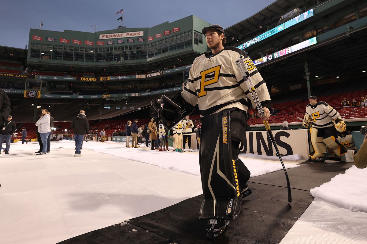 Tristan Jarry of the Pittsburgh Penguins walks to the ice to practice for the 2023 Winter Classic at Fenway Park on January 01, 2023 in Boston, Massachusetts.