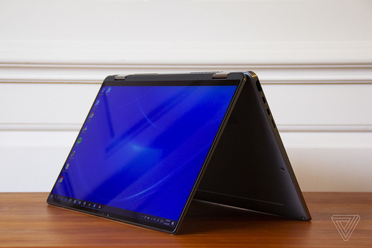 The Dell Latitude 9510 2-in-1 angled to the left in tent mode.