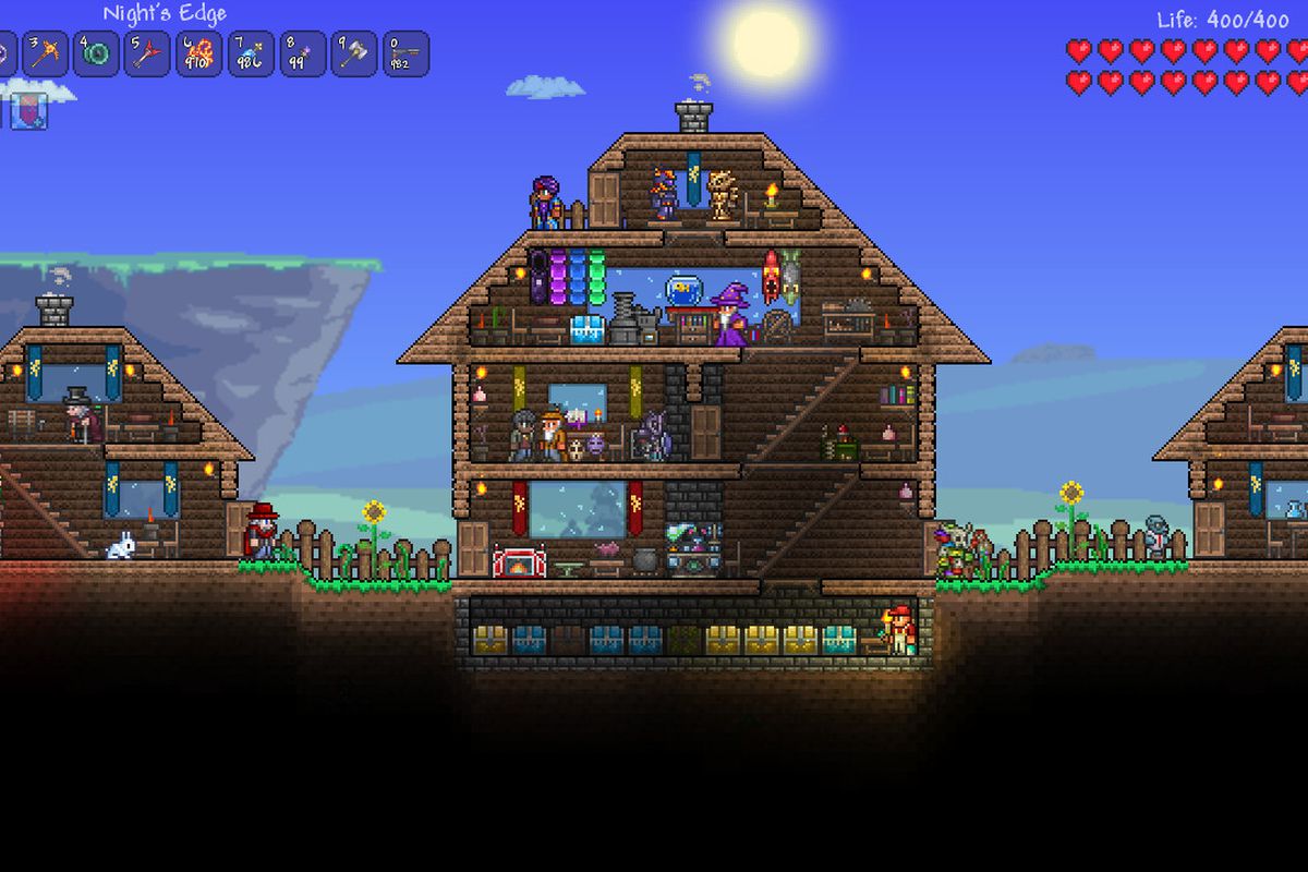 A screenshot taking from Terraria. It shows a multilevel house filled with characters. It has a brightly colored pixelated artstyle. 