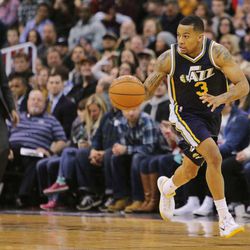 Utah Jazz guard Trey Burke (3) pushes the ball up court as the Jazz and the 76ers play Saturday, Dec. 27, 2014, at EnergySolutions arena in Salt Lake City. Jazz won 88-71.