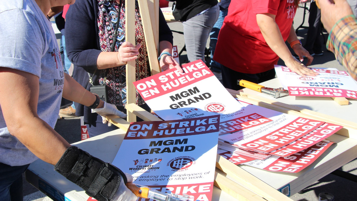 Culinary union members construct picket signs ahead of the strike deadline. 