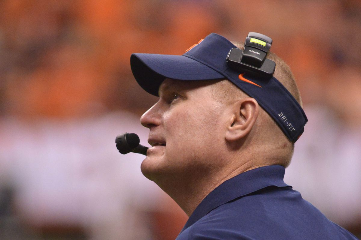 Nov 1, 2014; Syracuse, NY, USA; Syracuse Orange head coach Scott Shafer looks at the scoreboard during the third quarter of a game against the North Carolina State Wolfpack at the Carrier Dome. North Carolina State won the game 24-17.
