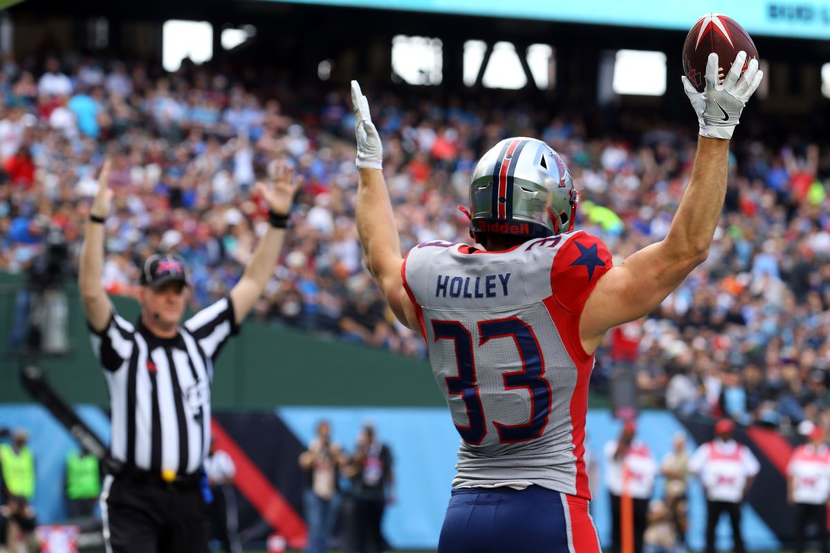 Nick Holley #33 of the Houston Roughnecks celebrates a touchdown against the Dallas Renegades in the first half at an XFL football game on March 01, 2020 in Arlington, Texas.