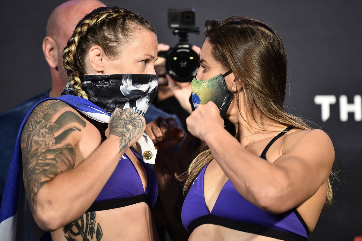 Opponents Joanne Calderwood of Scotland and Jennifer Maia of Brazil face off during the UFC Fight Night weigh-in at UFC APEX on July 31, 2020 in Las Vegas, Nevada.