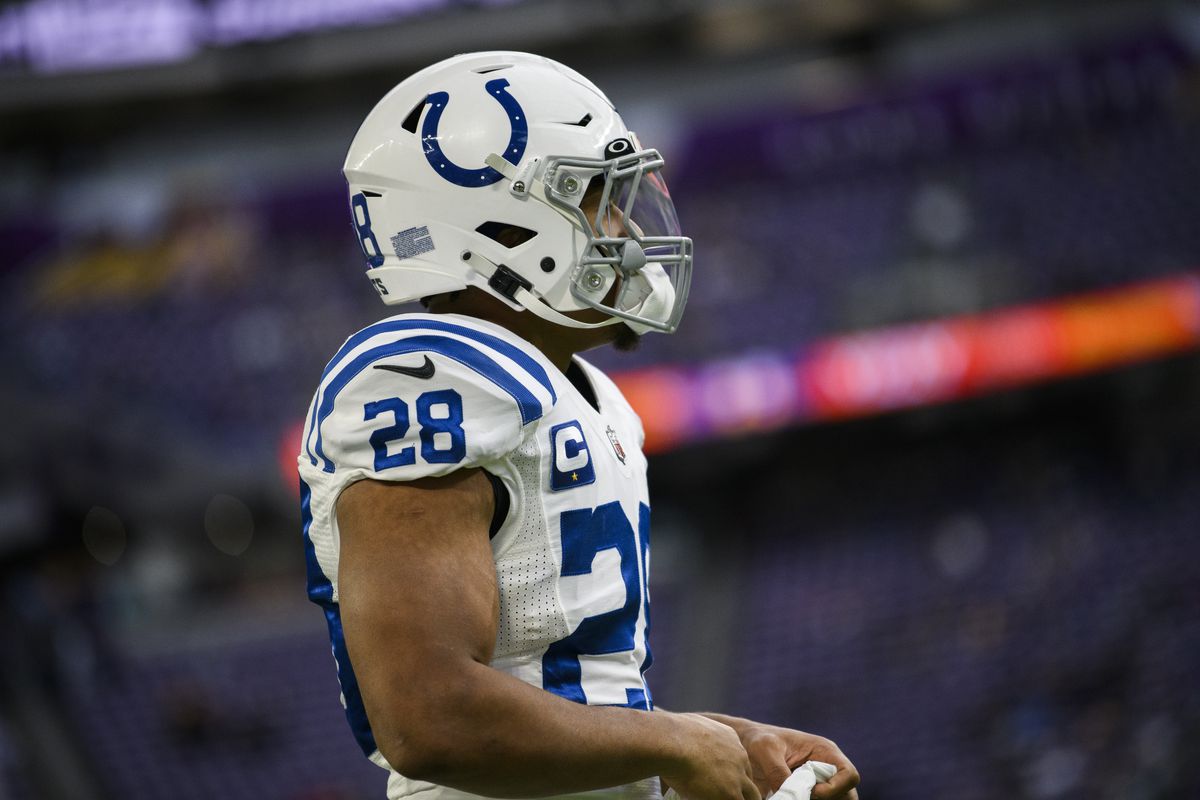 Jonathan Taylor #28 of the Indianapolis Colts warms up before the game against the Minnesota Vikings at U.S. Bank Stadium on December 17, 2022 in Minneapolis, Minnesota.