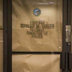 Brown paper covers the windows of Ald. Edward Burke’s office at City Hall. | Ashlee Rezin/Sun-Times