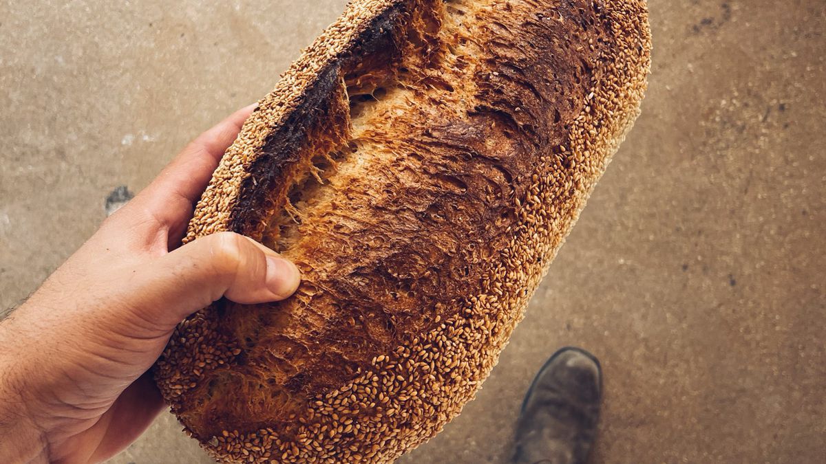 bread in hand. 