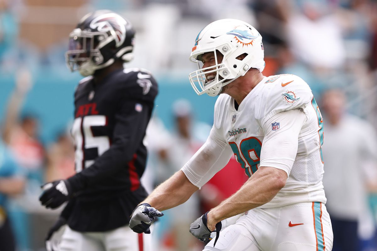 Mike Gesicki #88 of the Miami Dolphins reacts after a reception against the Atlanta Falcons during the fourth quarter at Hard Rock Stadium on October 24, 2021 in Miami Gardens, Florida.