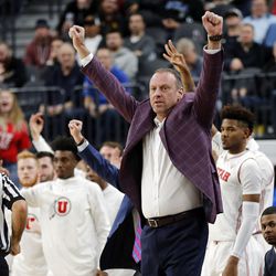 The Utah Utes and Utah Utes head coach Larry Krystkowiak celebrate a play against the Oregon Ducks during the Pac-12 basketball tournament in Las Vegas on Thursday, March 8, 2018.