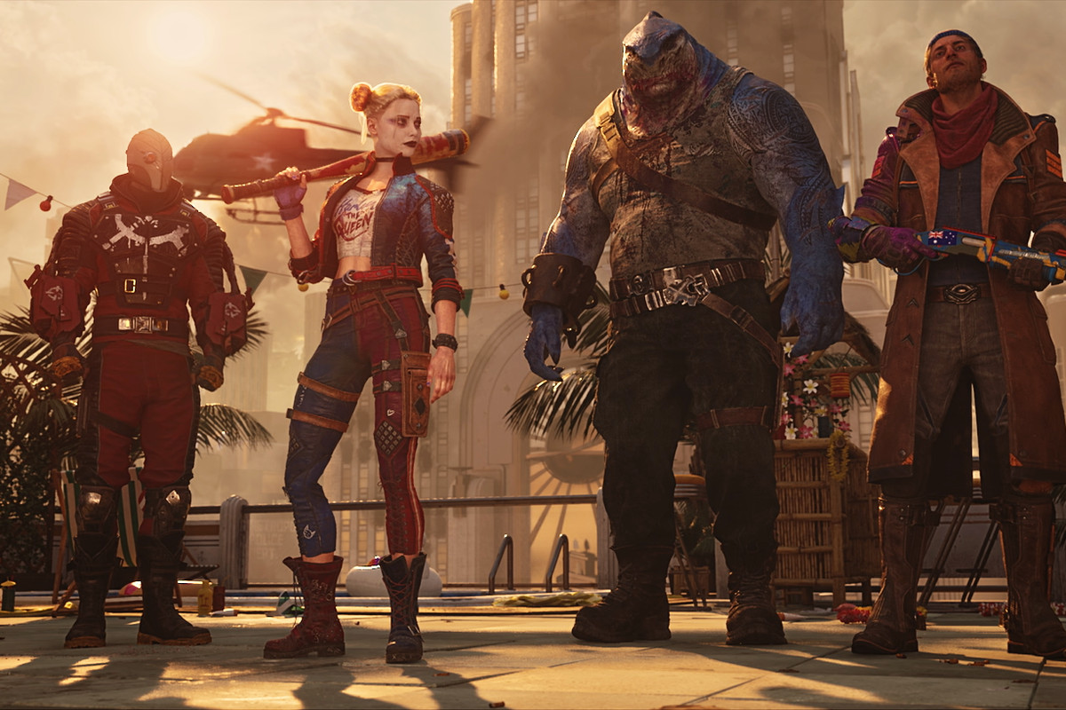 (L-R) Deadshot, Harley Quinn, King Shark, and Captain Boomerang standing on a rooftop with plumes of smoke in the distance.