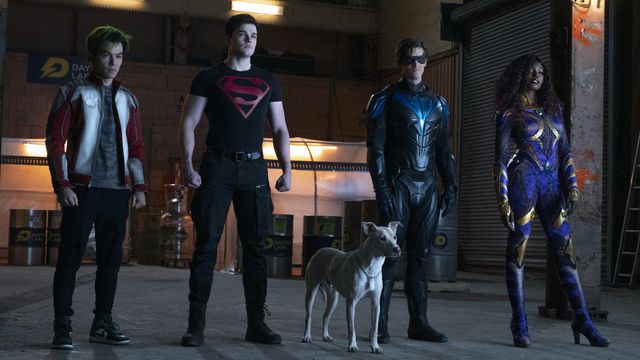 Ryan Potter, Joshua Orpin, Brenton Thwaites, Anna Diop stand in superhero-group lineup pose as Gar Logan, Superboy, Robin, and Starfire