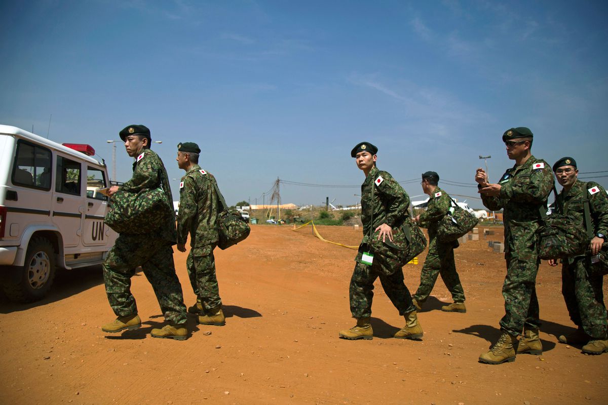 Members of the Self Defense Force arrive at the compound of the United Nations peacekeeping mission (UNMISS) after landing in Juba, South Sudan, on November 21, 2016.