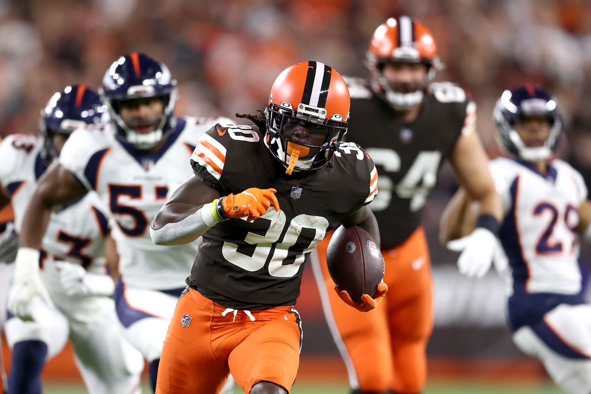 Running back D’Ernest Johnson of the Cleveland Browns runs with the ball after making a first quarter pass against the Denver Broncos at FirstEnergy Stadium on October 21, 2021 in Cleveland, Ohio.