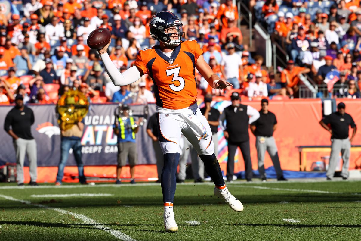 Drew Lock #3 of the Denver Broncos passes against the Baltimore Ravens at Empower Field At Mile High on October 3, 2021 in Denver, Colorado.