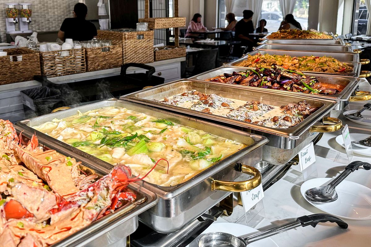 Traditional Filipino dishes from Mekeni Pinoy’s Pride at a buffet.