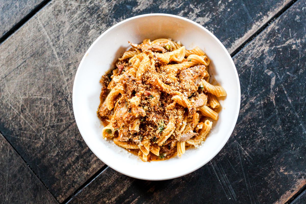 Garganelli pasta in a duck ragu full of red wine, prosciutto, rosemary, and bread crumbs from the Red Hen’s Tuscan pop-up.