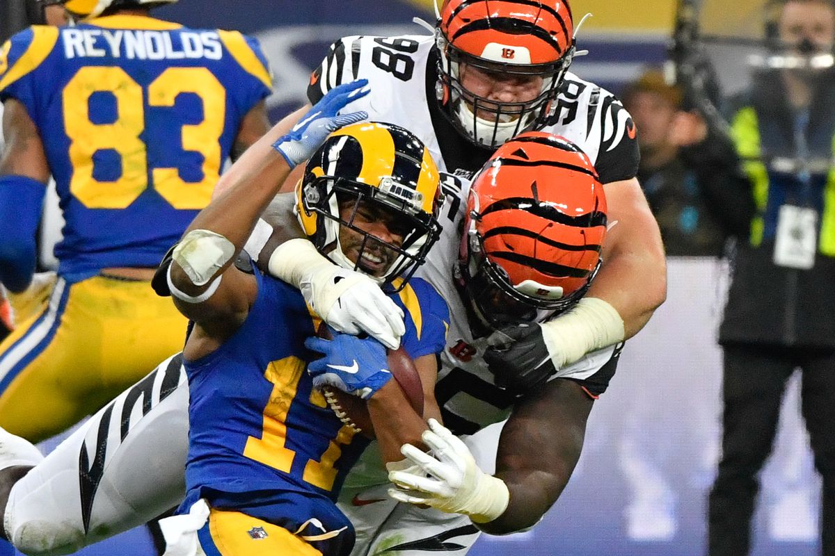 Cincinnati Bengals defensive tackle Ryan Glasgow and defensive tackle Renell Wren team up to tackle Los Angeles Rams wide receiver Robert Woods during the second half of the game between the Rams and Bengals at Wembley Stadium.&nbsp;