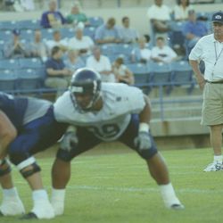 BYU head football coach LaVell Edwards watches during a scrimmage in August 2000.