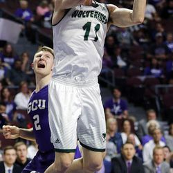 Utah Valley Wolverines guard Conner Toolson shoots with Joshua Braun of Grand Canyon in the background during the Western Athletic Conference basketball tournament in Las Vegas on Friday, March 9, 2018.