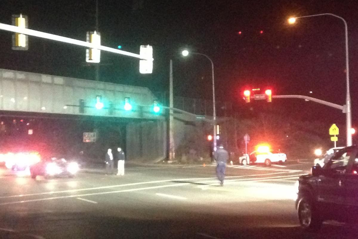 A man was hospitalized in critical condition Saturday night after police say he was hit by a car while crossing the street against a red light in Kearns.