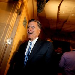 Mitt Romney, former governor of Massachusetts, exits the auditorium after addressing the Hinckley Institute of Politics at the University of Utah in Salt Lake City on Thursday, March 3,  2016, on the state of the 2016 presidential race.
