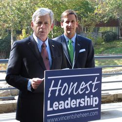 In this Oct. 28, 2014 file photo, independent gubernatorial candidate Tom Ervin speaks after suspending his campaign and endorsing Democratic candidate Vincent Sheheen, right, in Greenville, S.C. Ervin, a radio station owner, put up at least $3.8 million, and significantly more when post-election funding is counted, running for a seat no independent has ever won.