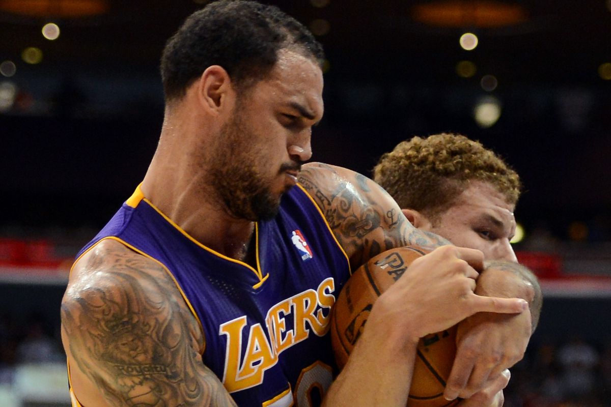 Sacre is making the most of his time as a Laker, including tangling with Griffin.
