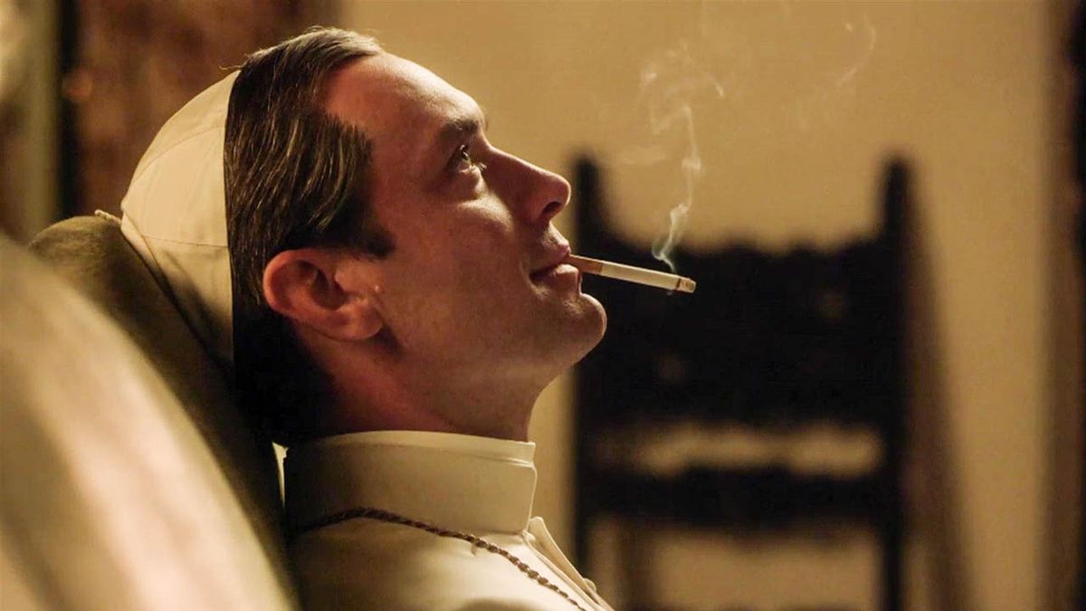 Playing the title character in HBO’s The Young Pope, Jude Law smokes a cigarette. 