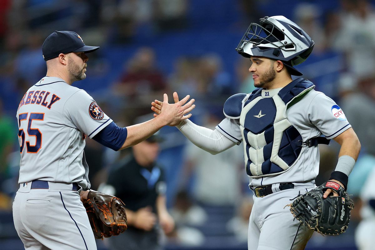 Ryan Pressly and Yainer Diaz of the Houston Astros shake hands after winning a game against the Tampa Bay Raysat Tropicana Field on April 26, 2023 in St Petersburg, Florida.