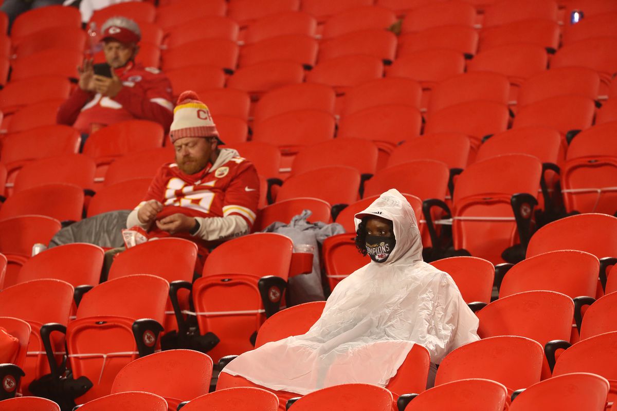 Kansas City Chiefs fans sits at halftime in the rain against the Houston Texans at Arrowhead Stadium on September 10, 2020 in Kansas City, Missouri.