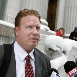 Jeremy Johnson speaks to reporters after a change of plea hearing at the Frank E. Moss United States Courthouse in Salt Lake City on Friday, Jan. 11, 2013.  Johnson is accused of bilking online customers out of hundreds of millions of dollars through his online business Iworks by putting through unauthorized charges for unwanted products. 