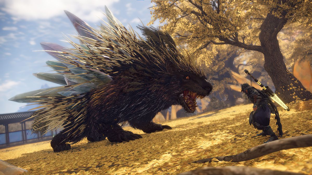 A giant porcupine infused with crystal spikes face a samurai in a golden forest in Wild Hearts