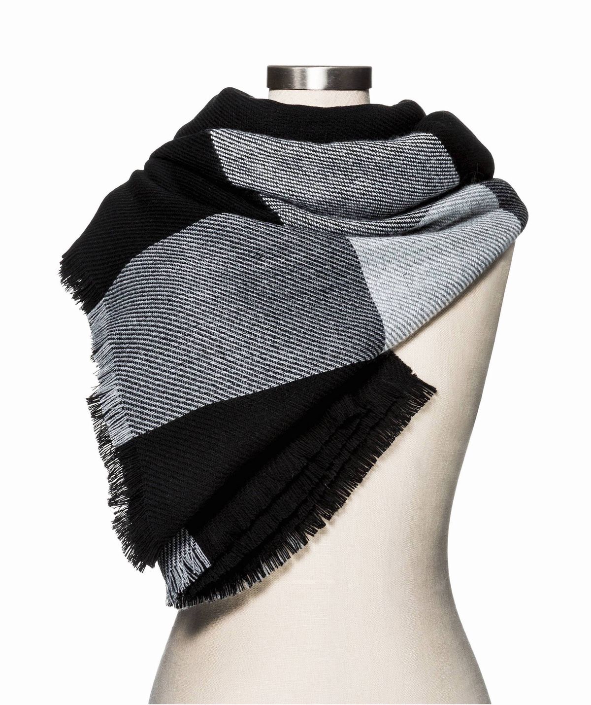 A gray and black blanket scarf on a mannequin