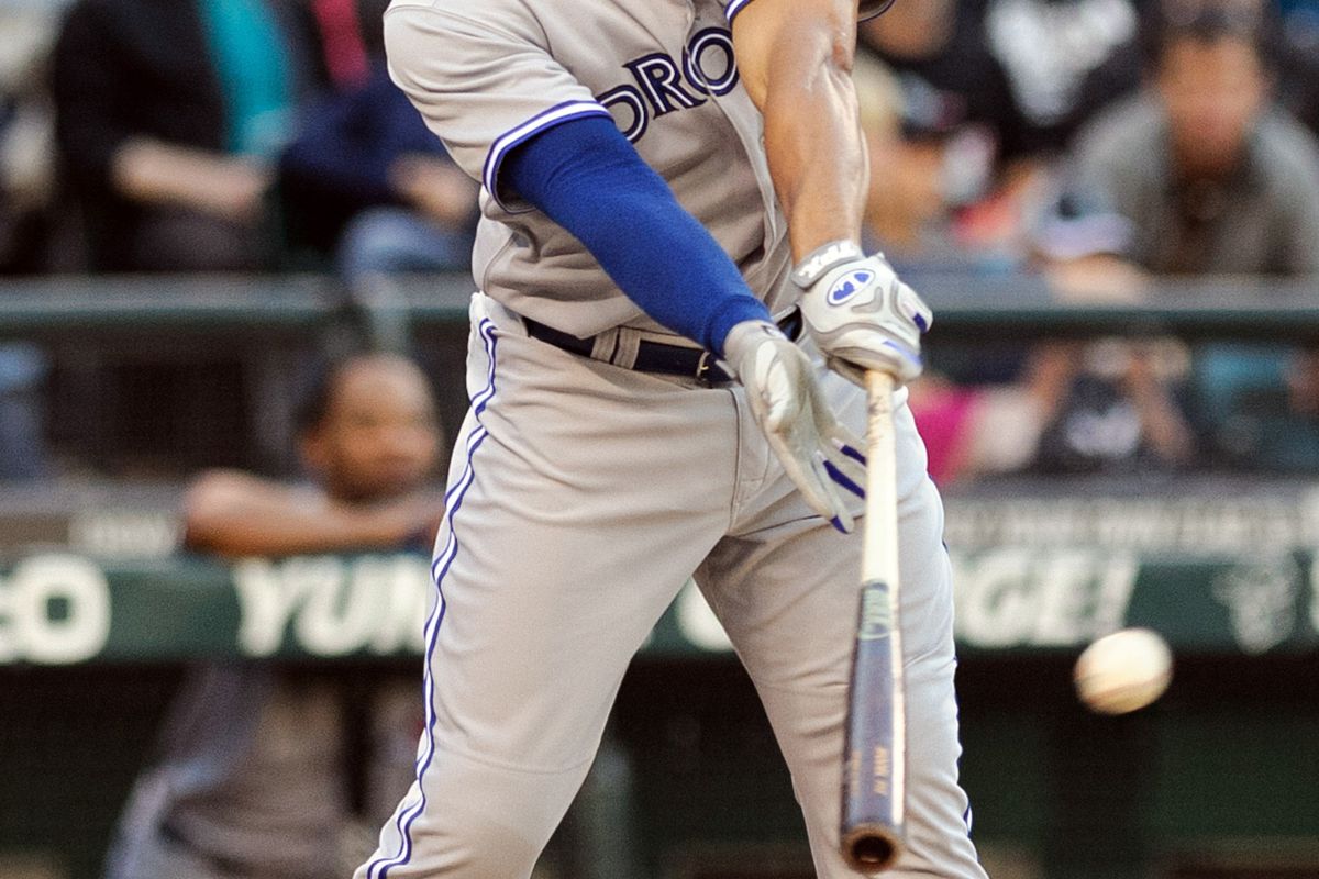 Jul 31, 2012; Seattle, WA, USA; Toronto Blue Jays right fielder Moises Sierra (14) hits a single against the Seattle Mariners during the 3rd inning at Safeco Field. Mandatory Credit: Steven Bisig-US PRESSWIRE